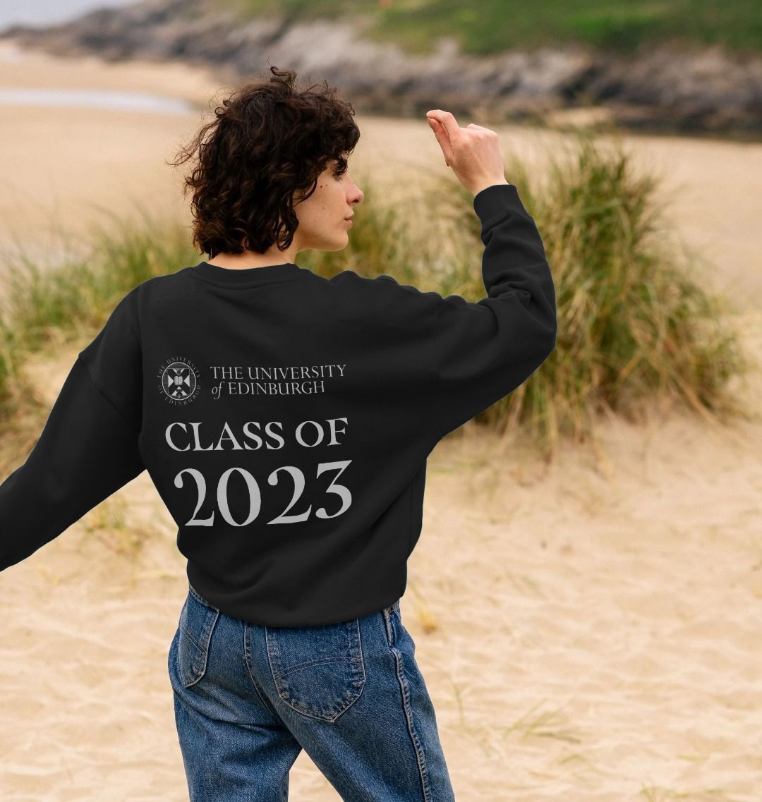 Model shows Black Class of 2023 Women's Oversized Sweatshirt.