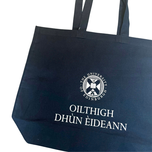 close-up of a navy tote bag with The University of Edinburgh crest and 'Oilthigh Dùn Èideann' (The University of Edinburgh in Gaelic)
