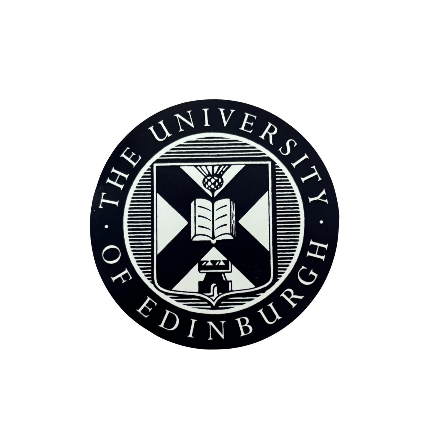 Navy sticker with a white University crest.