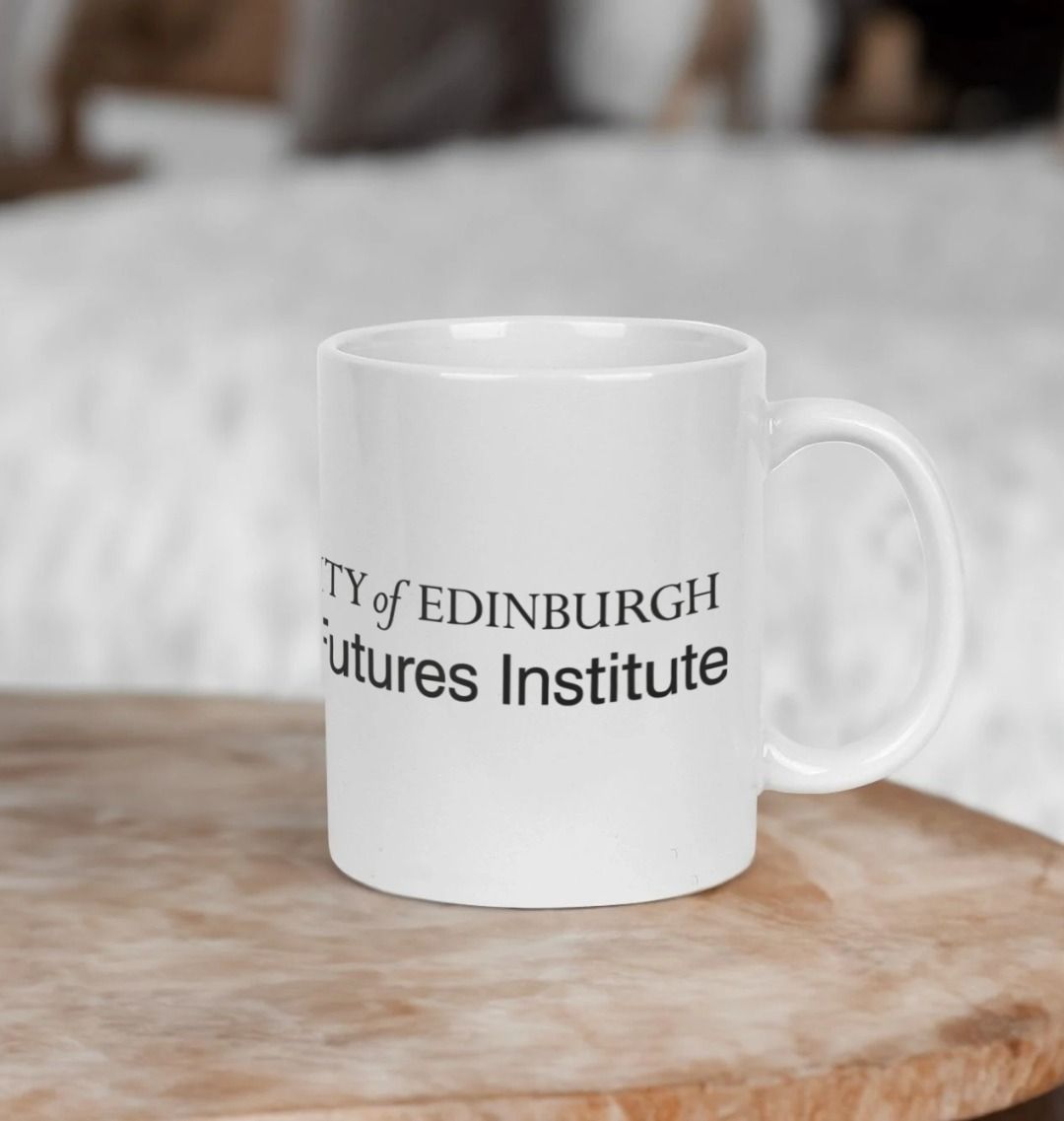 White Edinburgh Futures Institute Mug with printed black crest and logo.