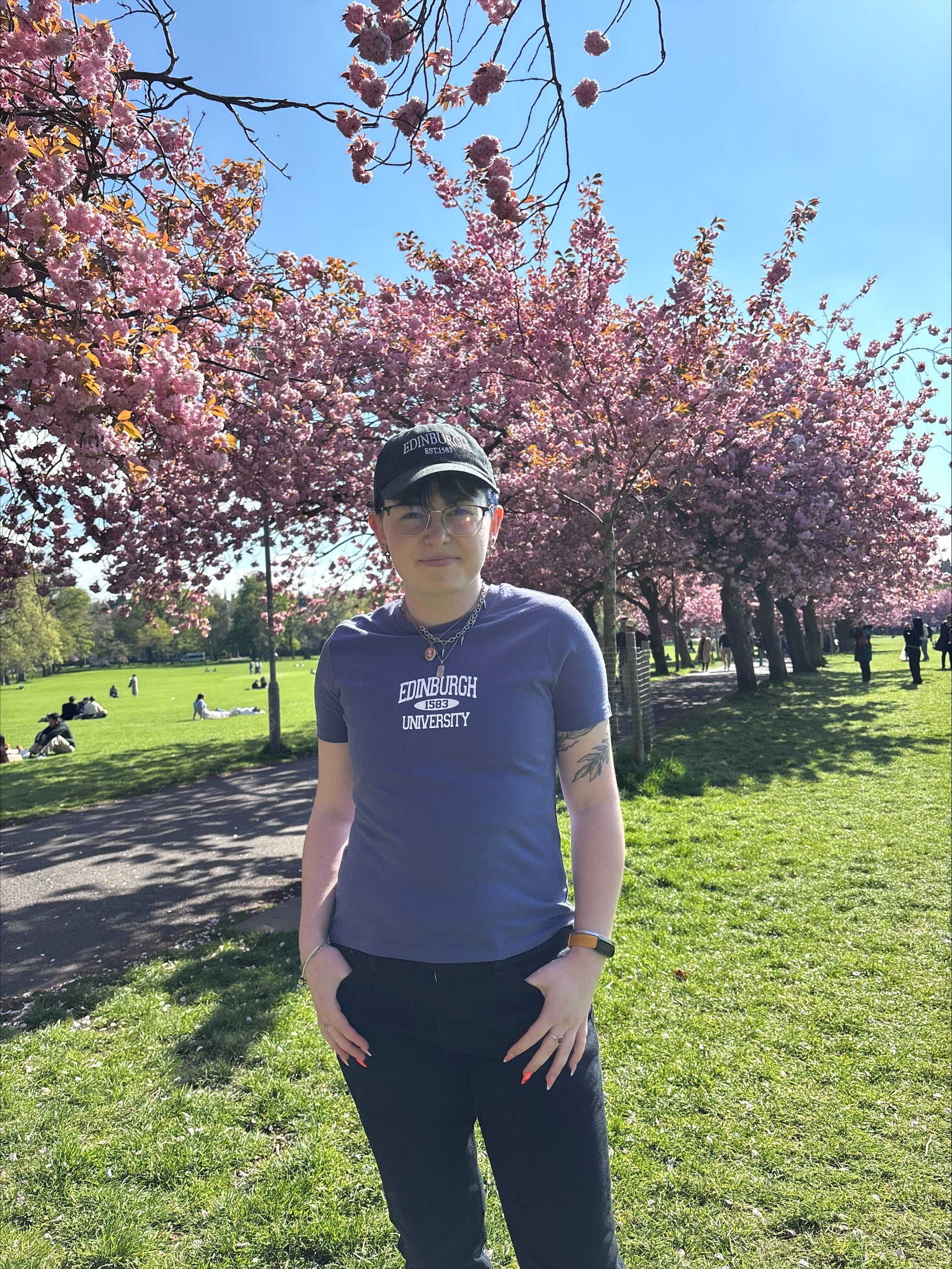 Model is pictured wearing our 1583 T-Shirt in the Meadows.