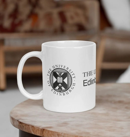 White Edinburgh Futures Institute Mug with printed black crest and logo. 
