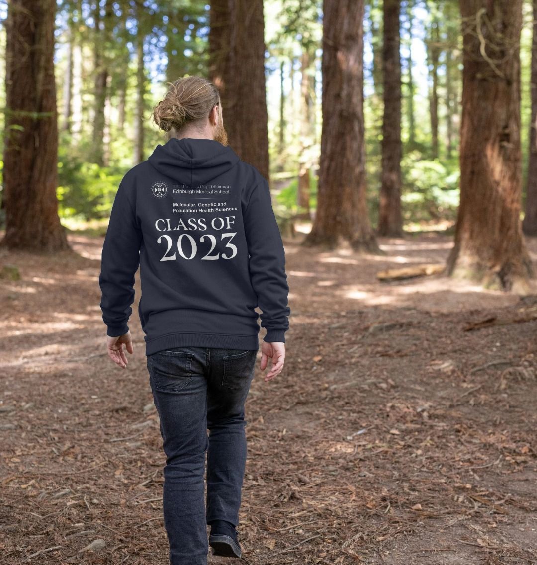 Model wears Navy Molecular, Genetic and Population Health Sciences 'Class Of' Graduate Hoodie showing back design.