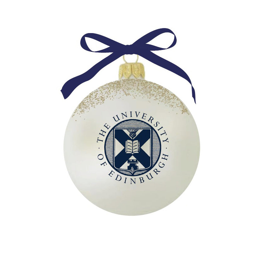 White bauble with a navy University of Edinburgh crest and gold glitter, tied with a navy ribbon