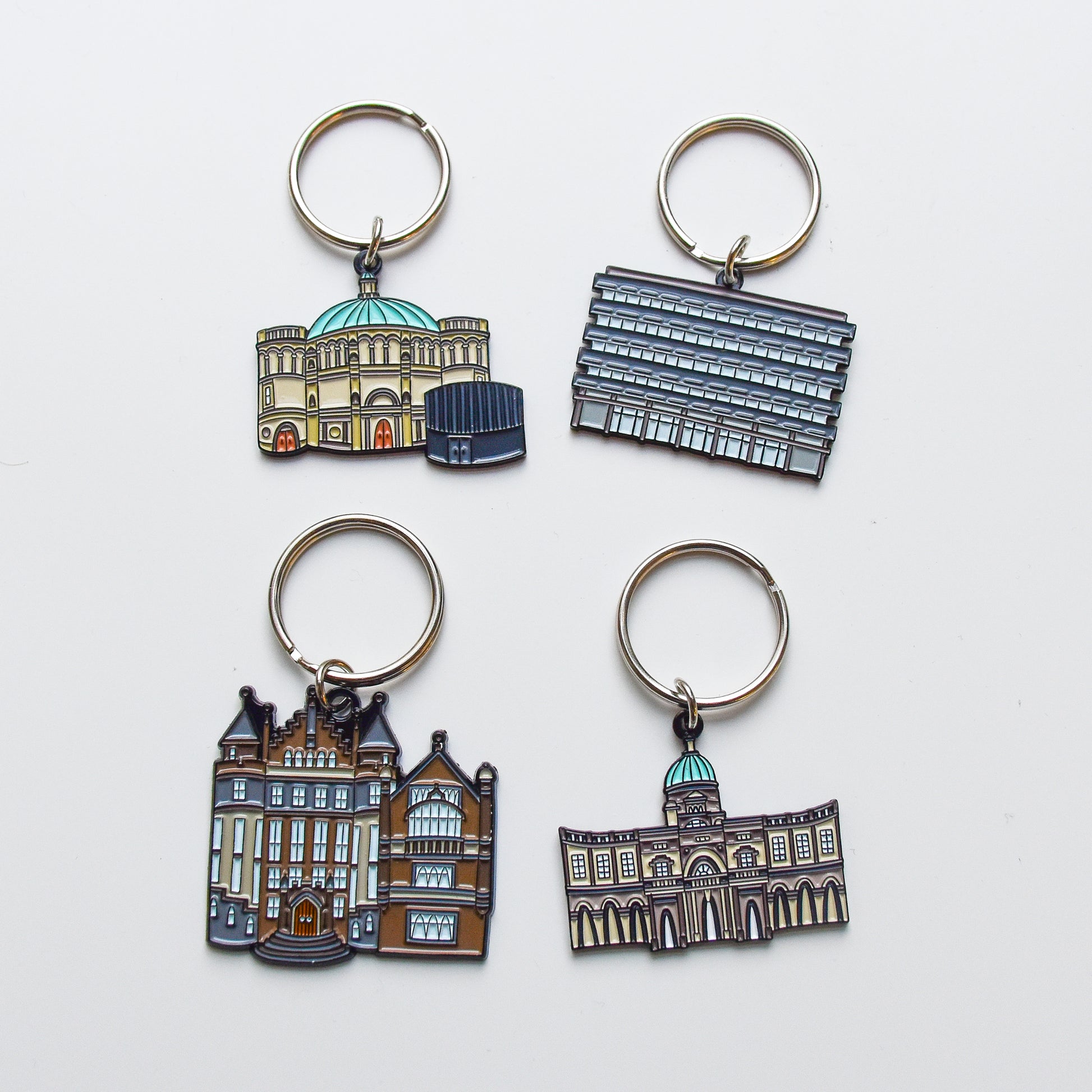 A collection of our enamel keyrings including McEwan Hall, The Main Library, Teviot Row House & Old College. 