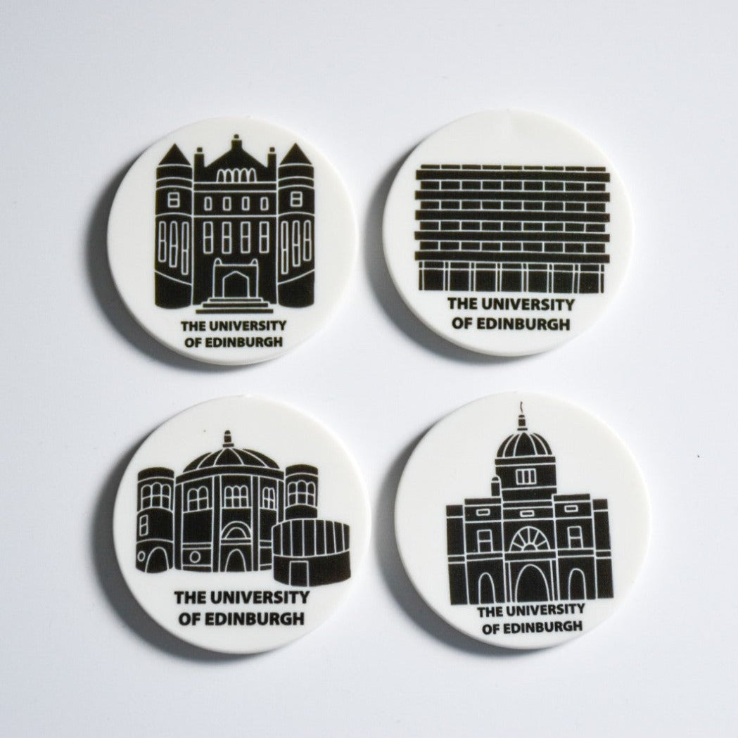 Four circular magnets each with black and white designs of various buildings from the University of Edinburgh.