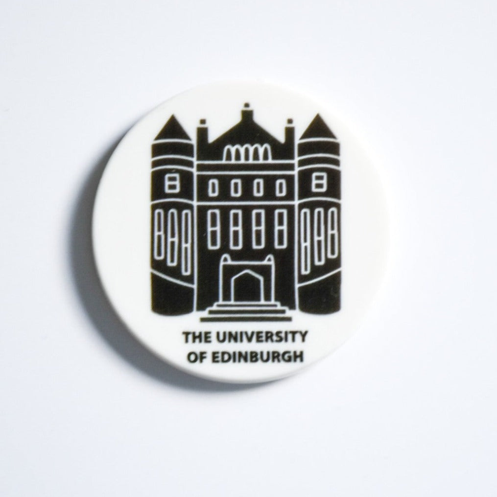 Circular magnet of a black and white design of the University of Edinburgh's Teviot House