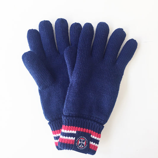 Pair of navy knitted gloves with red and white striped detailing at the cuffs and embroidered crest tag detailing. 