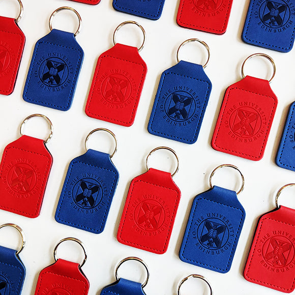 Our blue and red Leather Keyrings in a repeating pattern.m