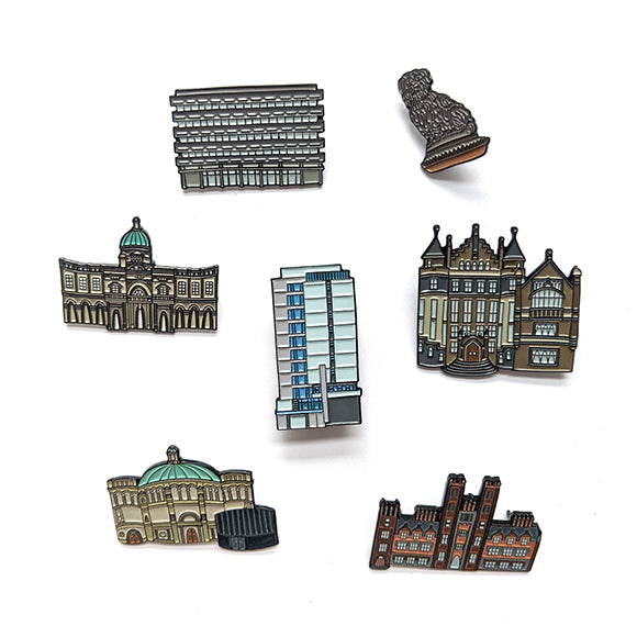 A collection of our enamel pin badges. The Library, Greyfriar's Bobby, Old College, Appleton Tower, Teviot Row House, McEwan Hall and New College 