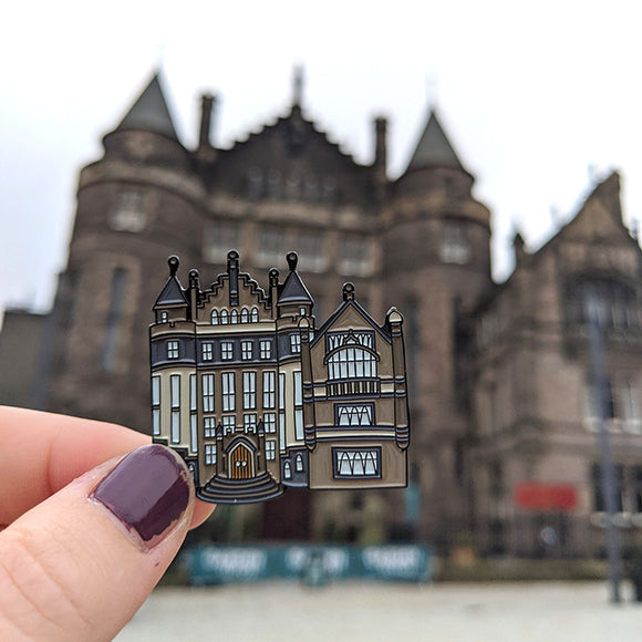 Our Teviot Row House Pin Badge in front of the real building.
