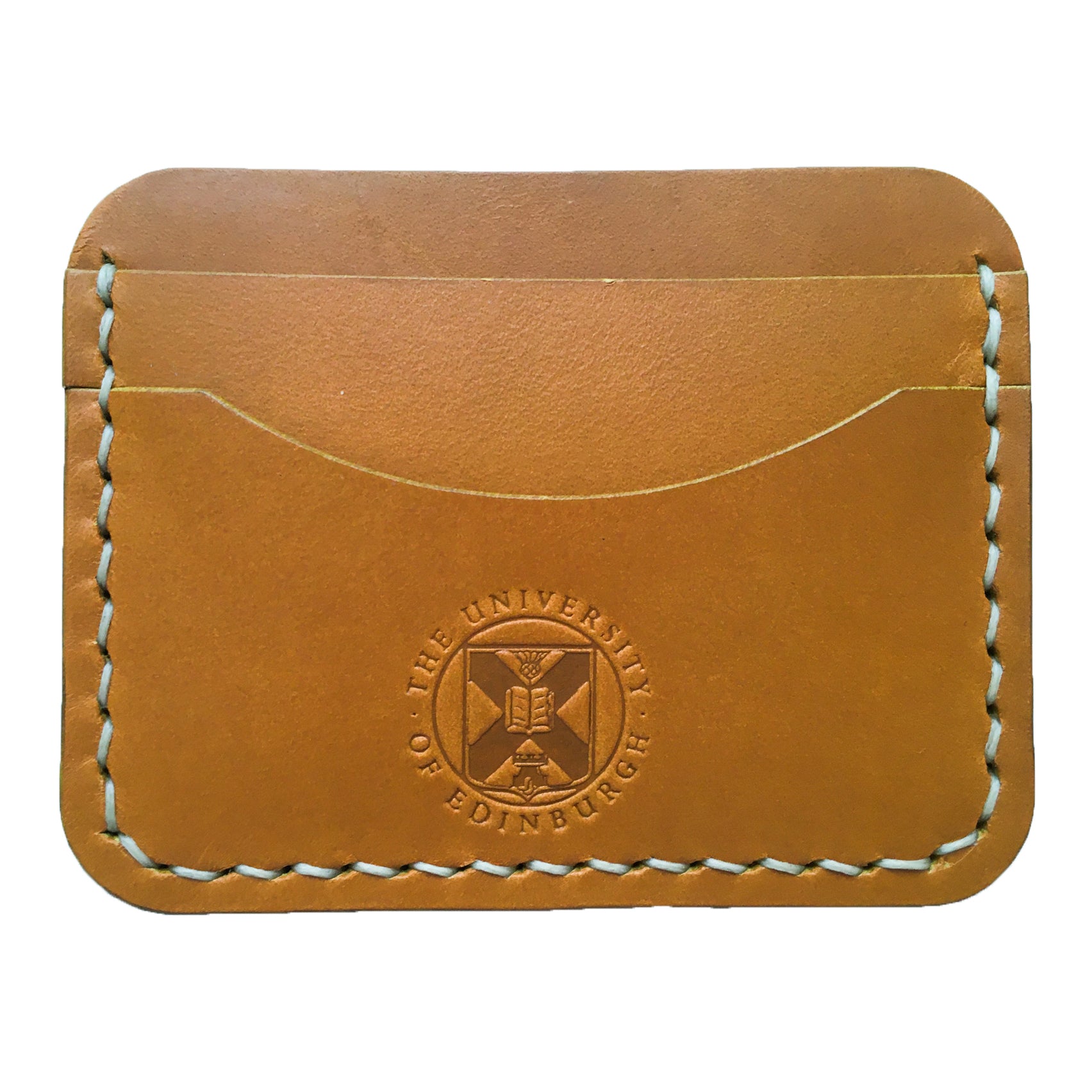 Close up of the yellow Leather Card Holder demonstrating the stitching detail and the embossed crest. 