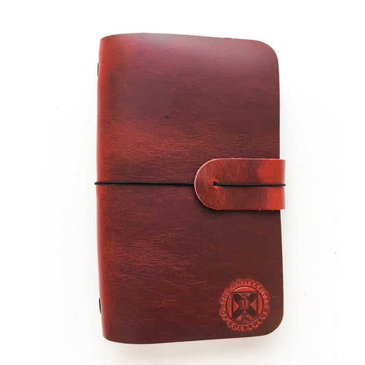 Burgundy Leather Journal Cover with black band and University crest embossing. 