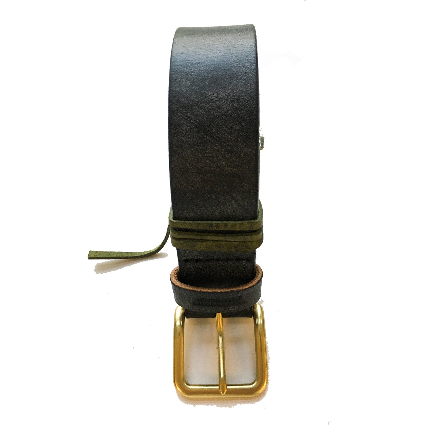 Black leather belt coiled up with gold hardware. 