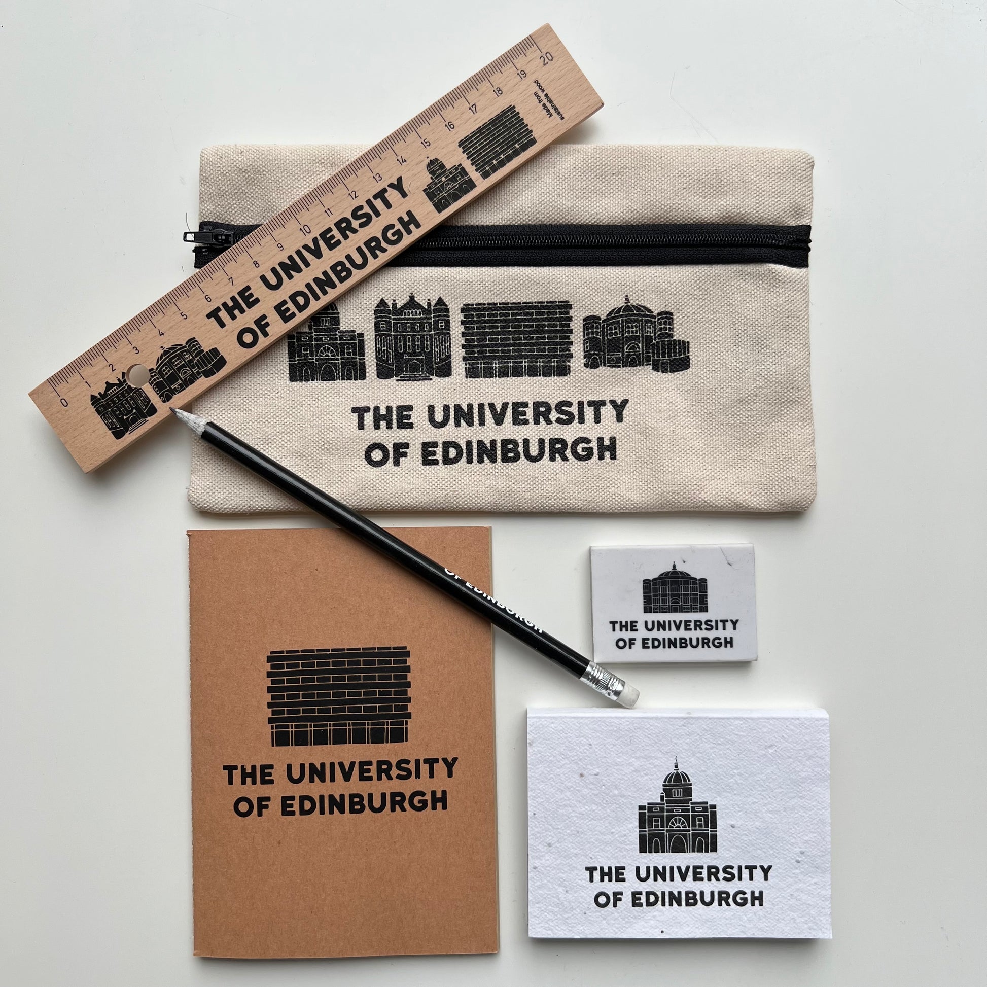 Our study range including our Wooden Ruler, Organic Cotton Pencil Case, Recycled Newspaper Pencil, McEwan Hall Eraser, A6 Recycled Notebook & Seeded Sticky Notes 