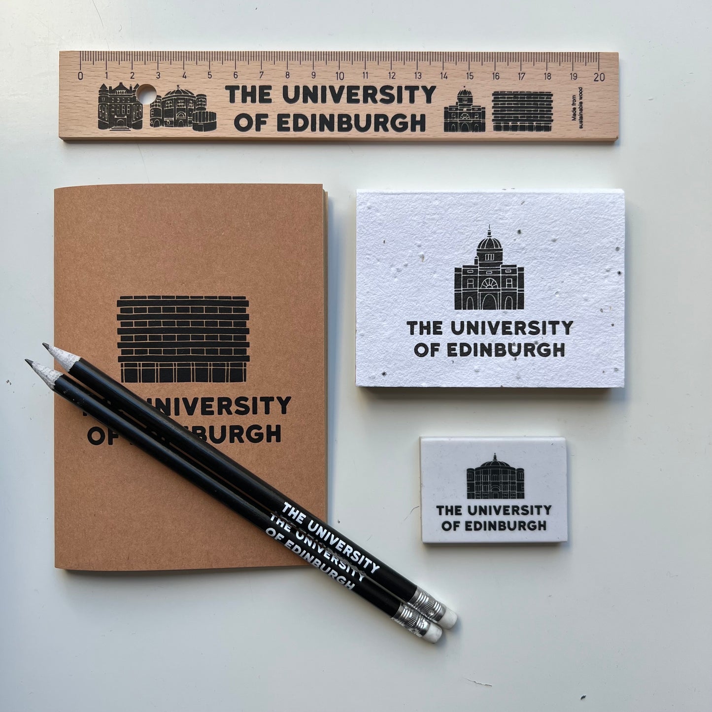 Our study range featuring : our Wooden Ruler, A6 Recycled Notebook, Seeded Sticky Notes, Mc Ewan Hall Eraser and Recycled Pencils. 