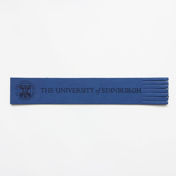 Recycled leather bookmark with embossed University crest in Blue, front view