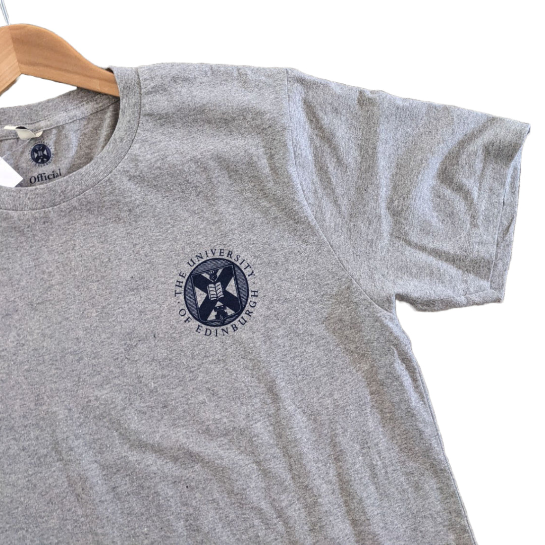 A light grey t-shirt with the University crest printed in navy