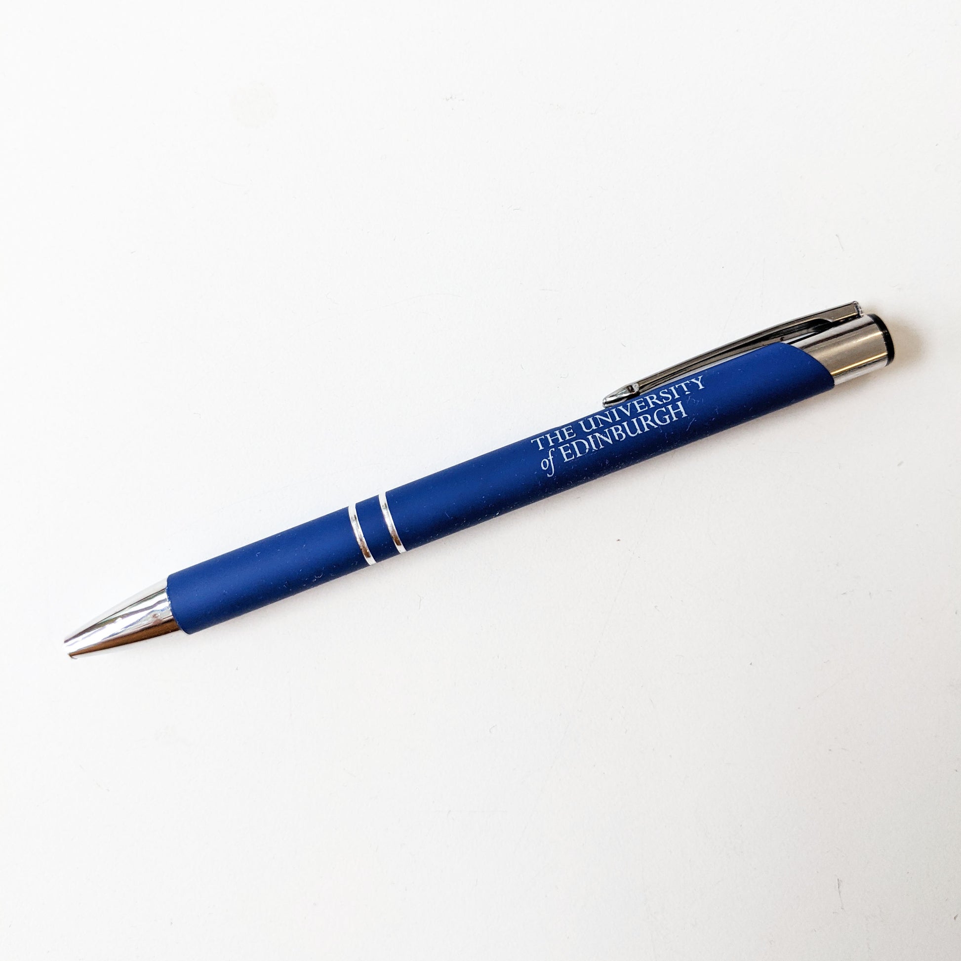 Blue soft feel pen with 'The University of Edinburgh' printed on the barrel in white.