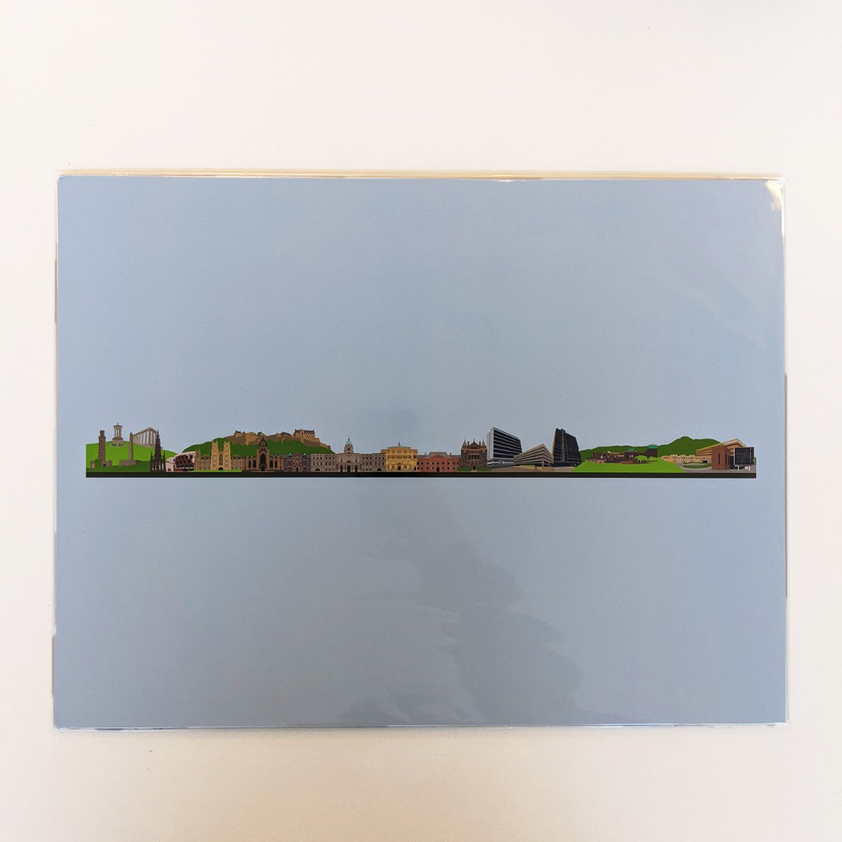 Illustration of the Edinburgh Skyline with a blue background. 