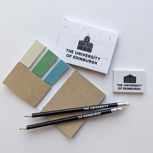 Sticky notes arranged alongside other stationery products in the range