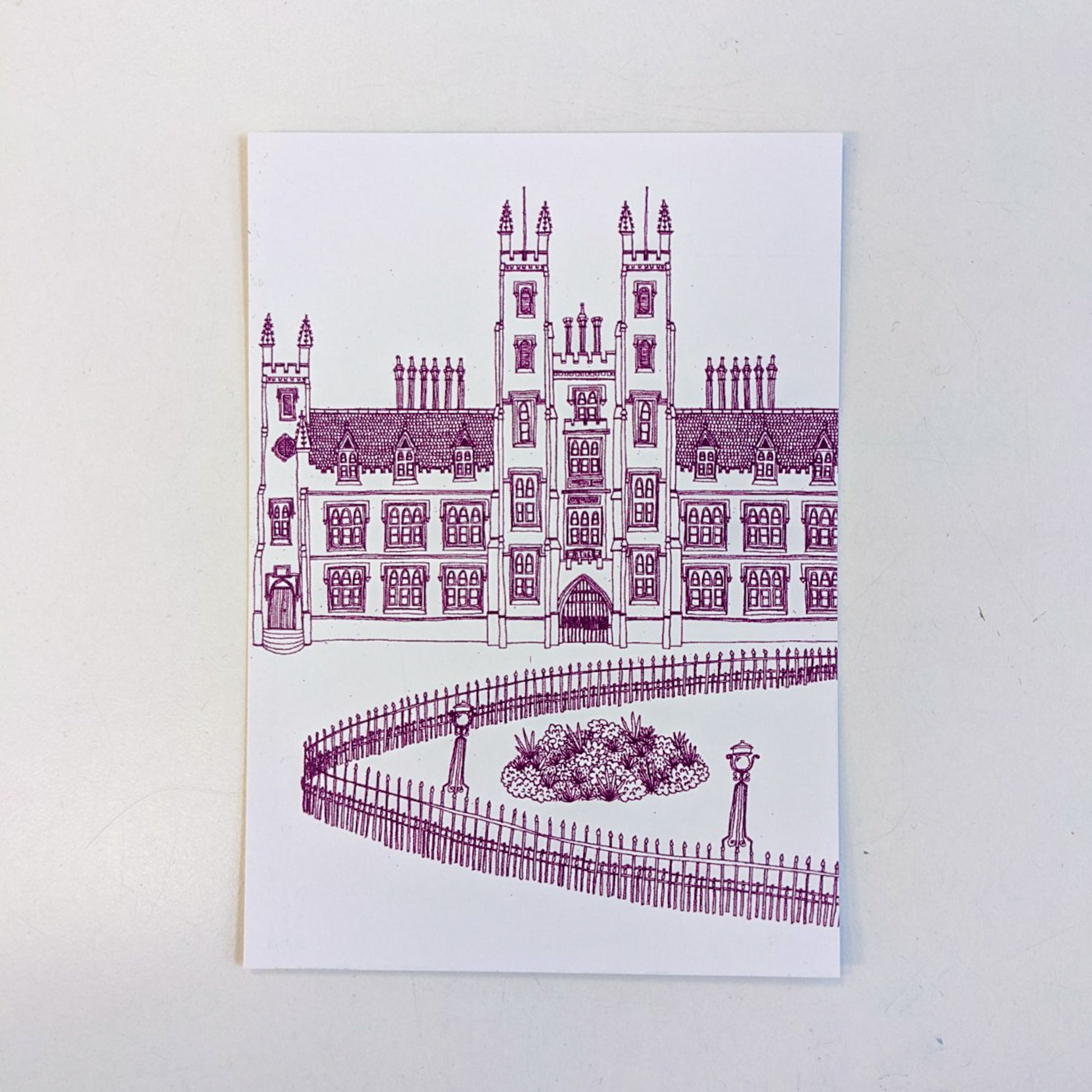 Illustrated image of New College by Victoria Rose Ball. The lines are maroon, set on a white background. The postcard is also set on a white background.