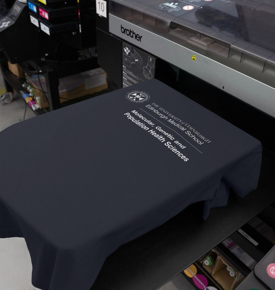 Our Edinburgh Medical School -Molecular, Genetic and Population Health Sciences T- shirt being printed by our print on demand partner, teemill