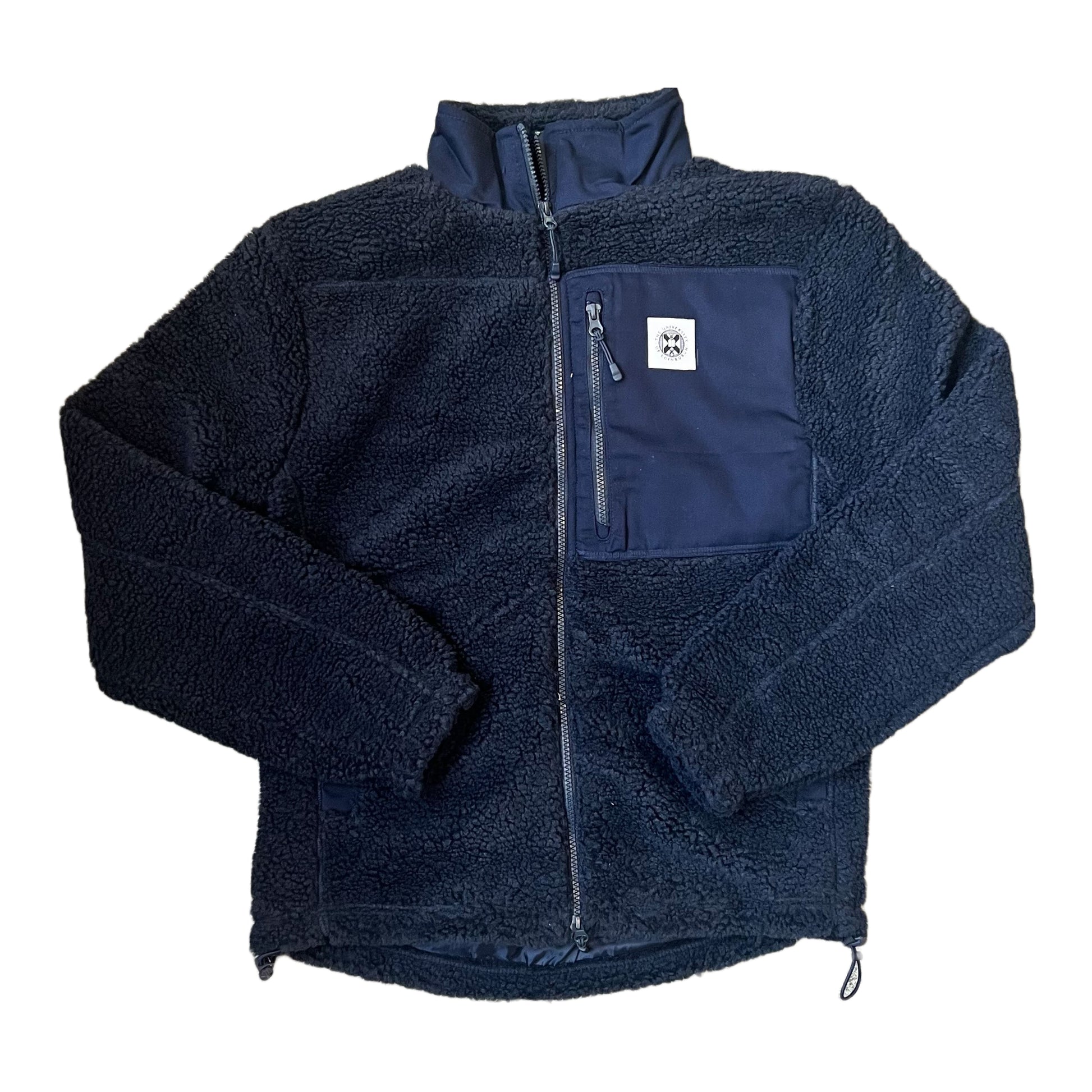 Navy fleece sherpa jacket with university crest label stitched on pocket.