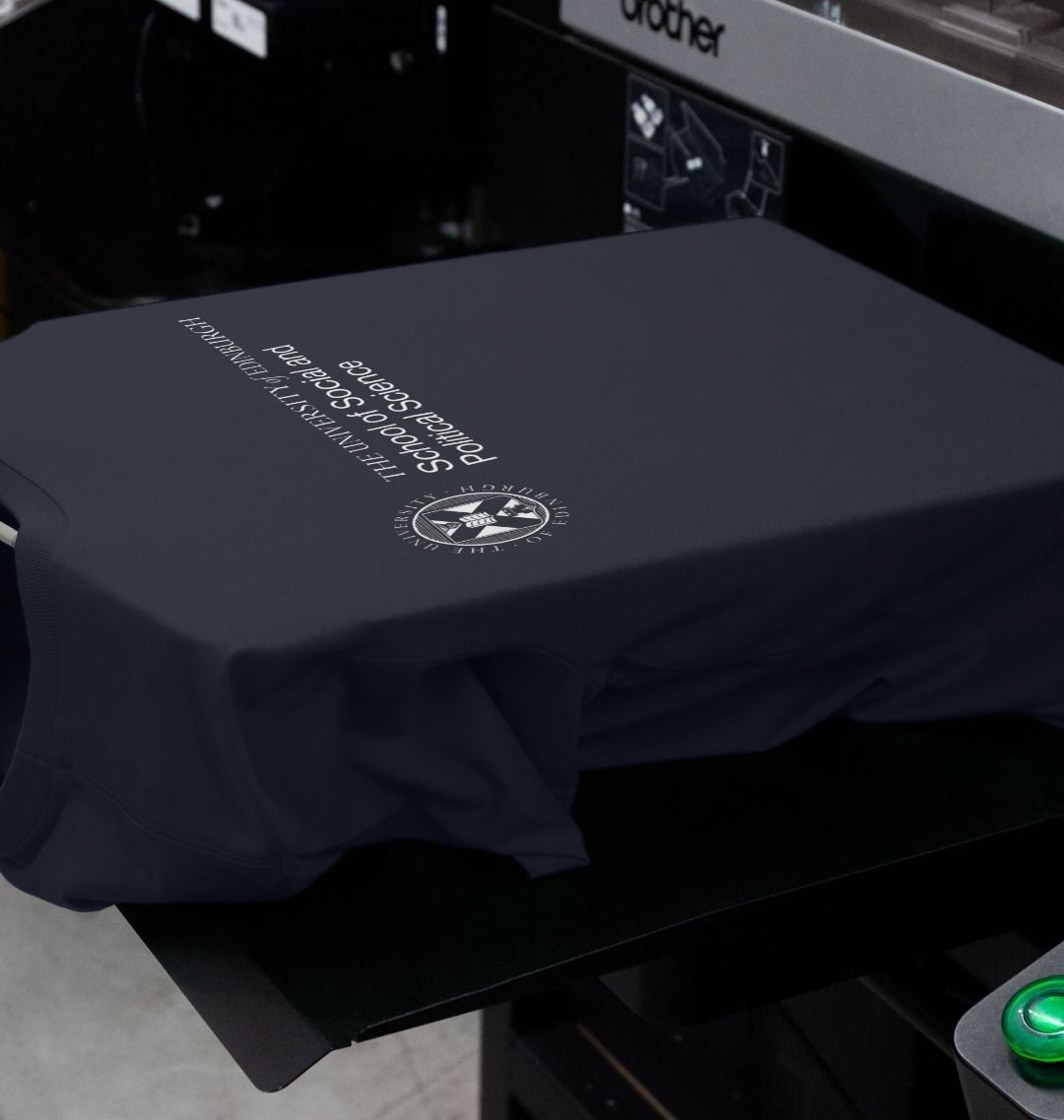 Our School of Social and Political Science T Shirt being printed by our print on demand partner, teemill.