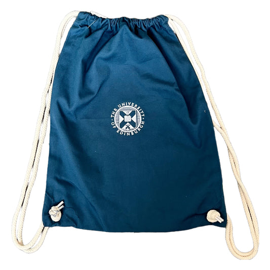 Organic cotton gym bag in airforce blue with ecru drawstring, featuring the university crest embroidered in white