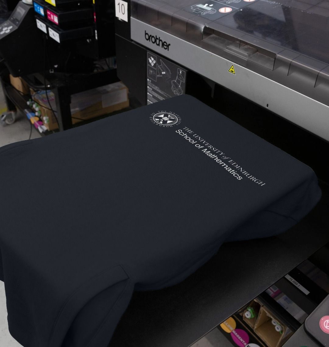 Our School of Mathematics  Hoodie being printed by our print on demand partner, teemill.