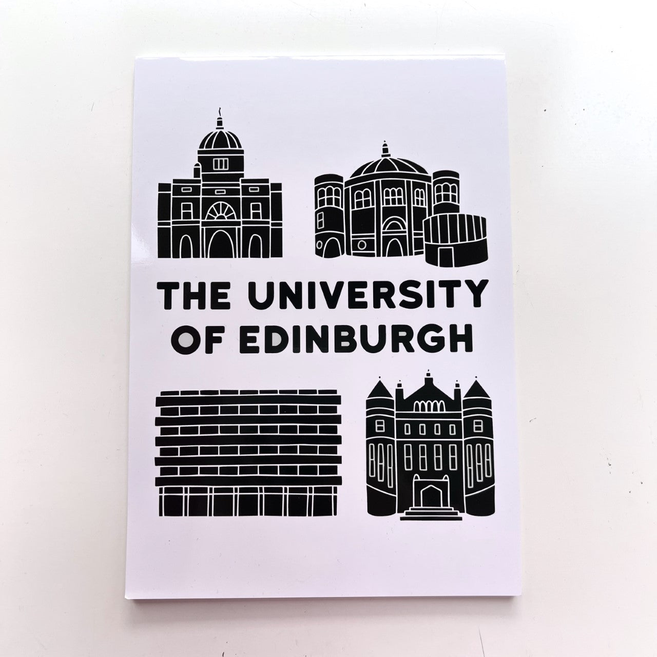 White A4 Recycled Notepad with Black block printing of Edinburgh University buildings and text that reads: 'The University of Edinburgh'