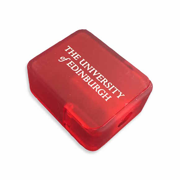 Red pencil sharpener with the University of Edinburgh text, placed diagonally