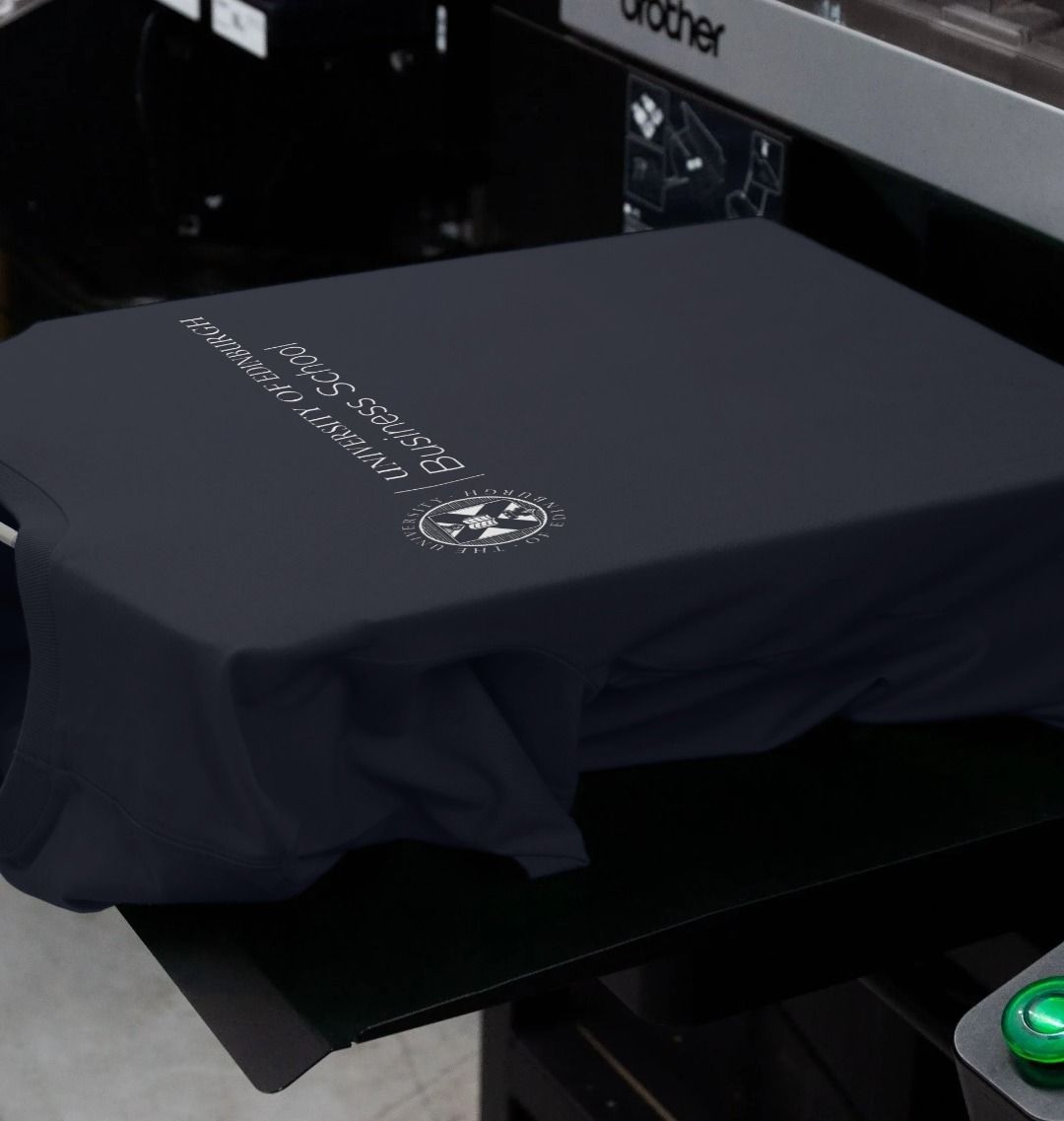 Our Business School T-Shirt being printed by our print on demand partner, teemill.