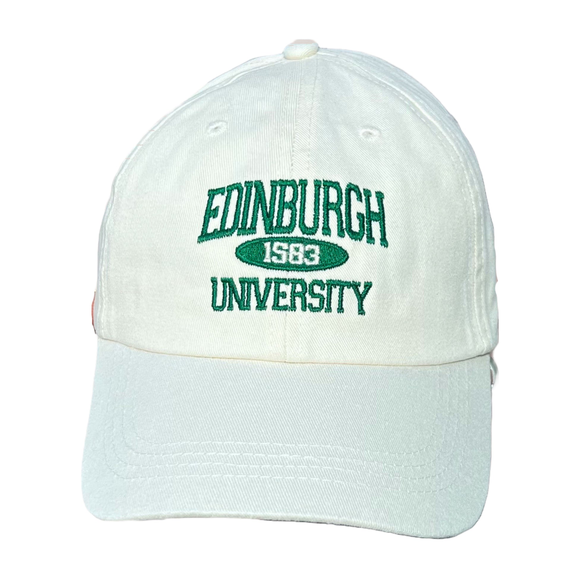 Front view of cream baseball cap with green embriodered text stating 'EDINBURGH UNIVERSITY'.
