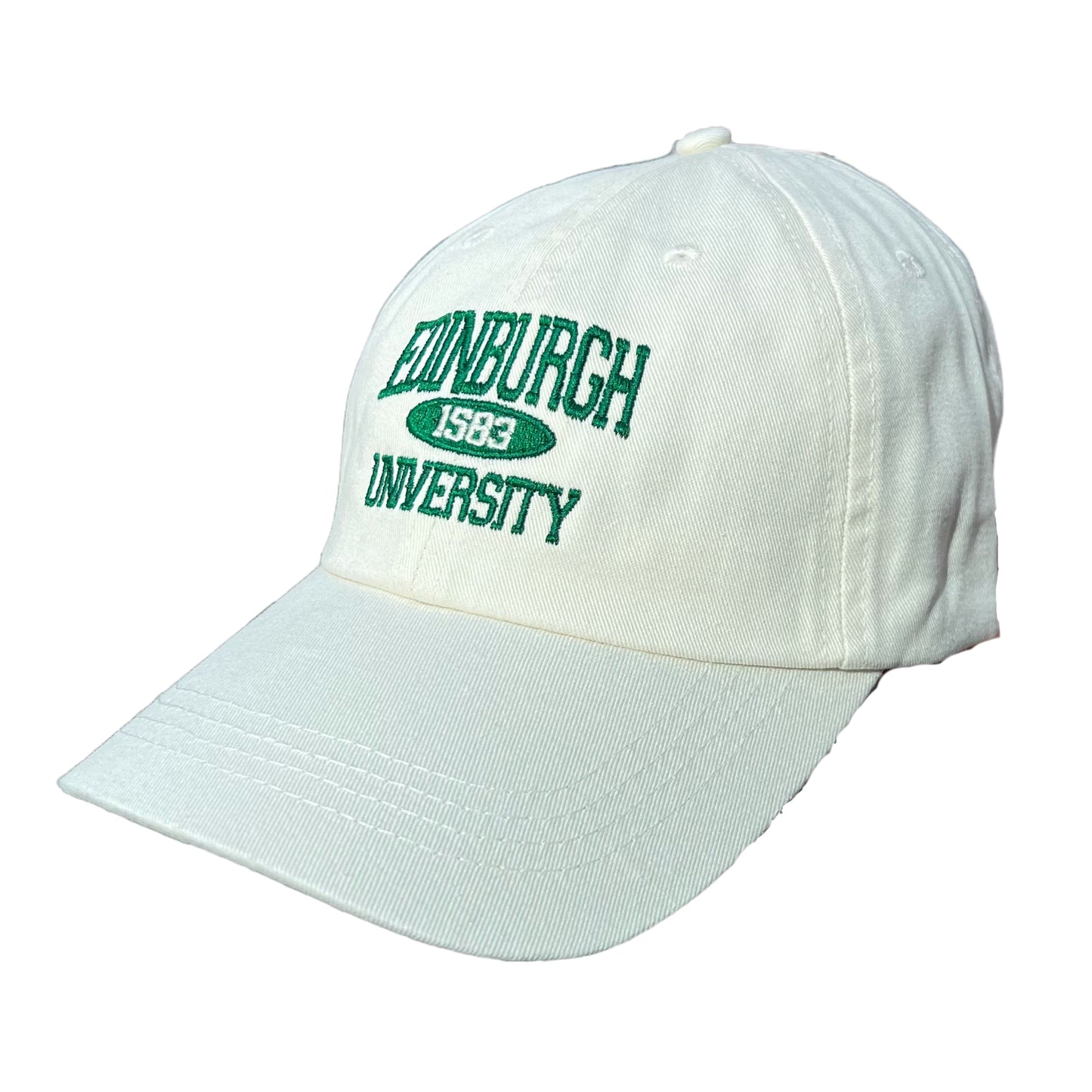Cream Baseball cap with green embriodered text stating 'EDINGBURGH UNIVERSITY'. Inbetween is text stating '1583'.