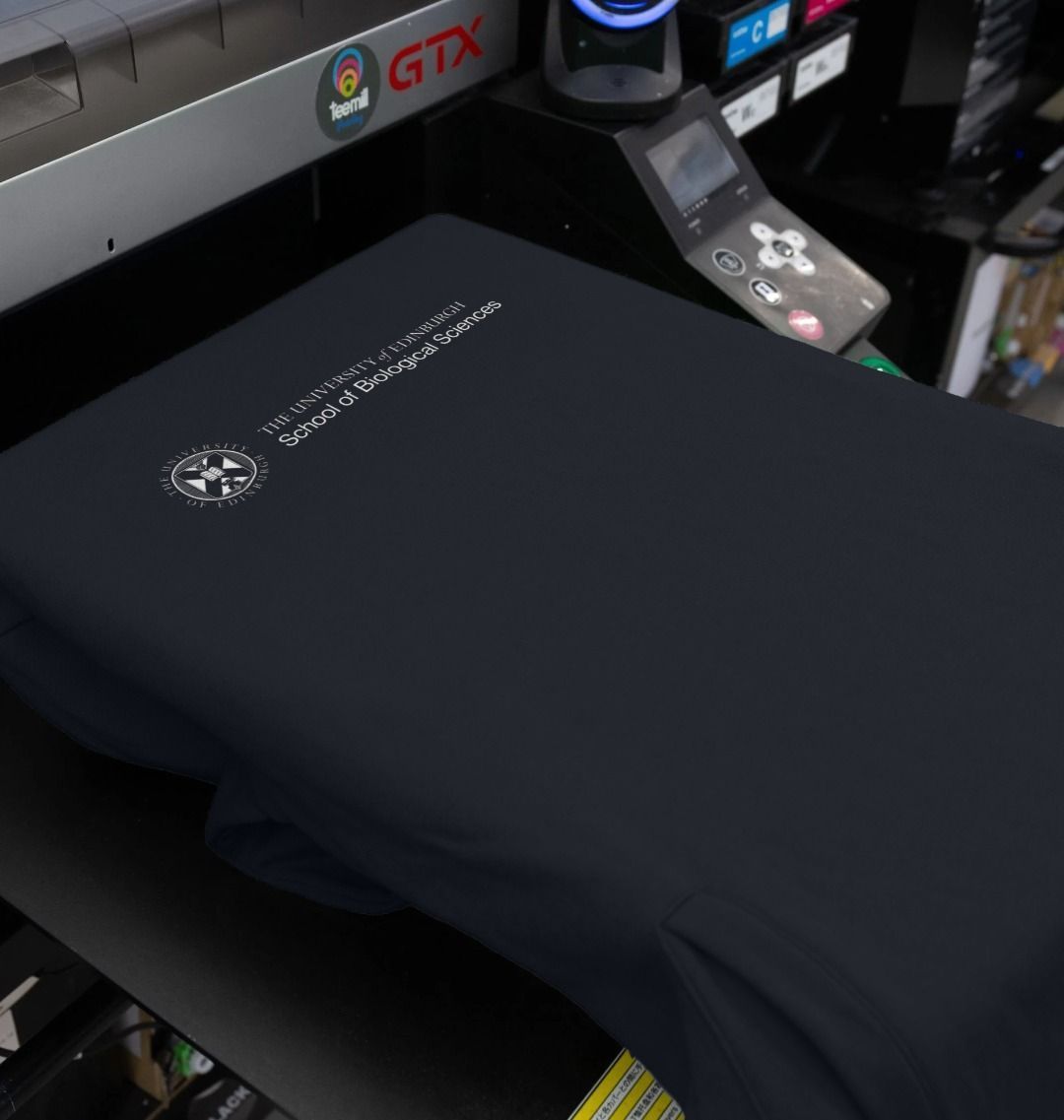 Our School of Biological Sciences Hoodie being printed by our print on demand partner, teemill